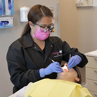 Christina with a Patient at Singing River Dentistry in Athens, AL.