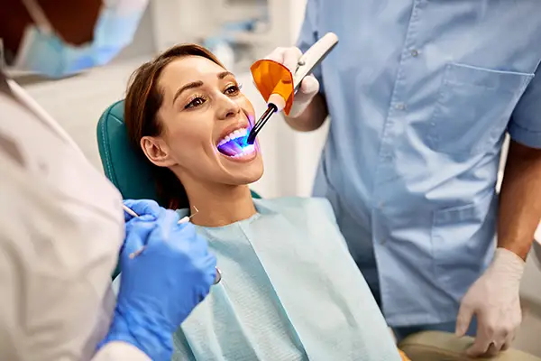 Woman getting dental bonding