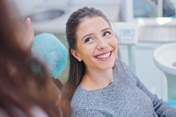 Woman smiling while at dental office Woman smiling while at dental office